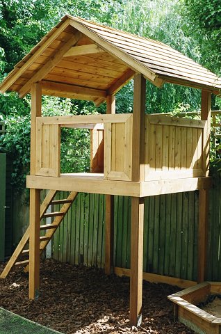 Western red cedar play house with ladder and play bark